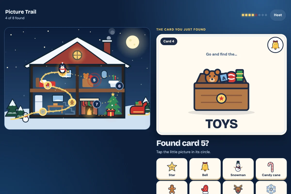 The free Christmas companion: a snowy cottage map with a Christmas tree, a fireplace and a sleigh, a picture clue card and big picture-code buttons