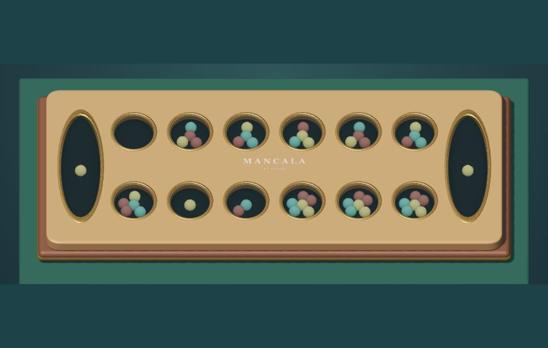 Jewel seeds in the cups of the At Yours Mancala board
